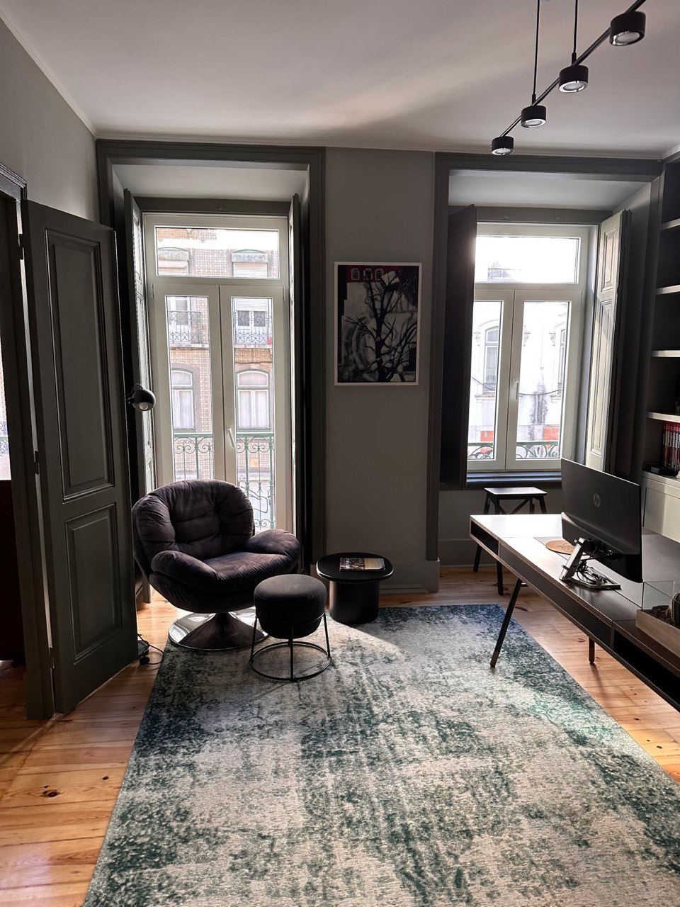 Shades of Grey — historic Lisbon apartment, grey palette and architectural mouldings